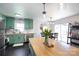 Stylish kitchen with wood countertops, stainless appliances, and an eat-in dining area at 109 Hunter Ct, Oakboro, NC 28129