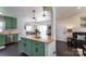 Eat-in kitchen featuring a center island, stainless steel appliances, and an open floorplan at 109 Hunter Ct, Oakboro, NC 28129