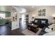 Open floor plan featuring a view from the living room into the charming kitchen at 109 Hunter Ct, Oakboro, NC 28129