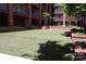 View of the large lawn area in the building's courtyard at 1101 W 1St St # 408, Charlotte, NC 28202