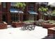 Brick patio with outdoor grill and a picnic table at 1101 W 1St St, Charlotte, NC 28202