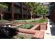 Brick-planters encircle the artificial turf of this building's beautiful courtyard at 1101 W 1St St # 408, Charlotte, NC 28202