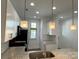 Bright kitchen showcasing granite countertops, stylish pendant lighting, and stainless steel appliances at 1101 W 1St St, Charlotte, NC 28202