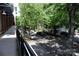Quiet street with mature trees near the building at 1101 W 1St St # 408, Charlotte, NC 28202