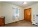 Clean bedroom featuring a window, closet and colorful dresser at 115 Patterson Rd, Kings Mountain, NC 28086