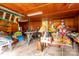 Spacious garage with wood paneling and ample storage space for tools and equipment at 115 Patterson Rd, Kings Mountain, NC 28086