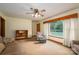 Inviting living room featuring large windows, neutral colors, and comfortable seating arrangements at 115 Patterson Rd, Kings Mountain, NC 28086