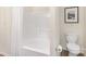 Bright bathroom with white tiled shower and a matching white toilet at 12624 Cedar Crossings Dr, Charlotte, NC 28273