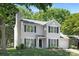 Traditional two-story home with lush green lawn and mature trees at 12624 Cedar Crossings Dr, Charlotte, NC 28273