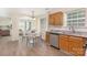 Charming kitchen featuring stainless steel appliances, granite counters, and cozy breakfast nook at 12624 Cedar Crossings Dr, Charlotte, NC 28273