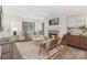 Comfortable living area featuring a fireplace, ceiling fan, and comfortable seating at 12624 Cedar Crossings Dr, Charlotte, NC 28273