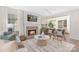 Cozy living room with a brick fireplace, stylish furniture, and ample natural light at 12624 Cedar Crossings Dr, Charlotte, NC 28273