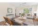 Bright living room with modern decor, neutral tones, and lots of natural light at 12624 Cedar Crossings Dr, Charlotte, NC 28273