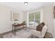 Bright home office space with a large window and modern desk setup at 12624 Cedar Crossings Dr, Charlotte, NC 28273