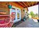 Inviting back porch with outdoor seating and a view of the surrounding landscape at 1307 Tiffany Ln, Shelby, NC 28152