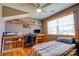 Bedroom with neutral walls, wood trim, natural light and workstation at 1307 Tiffany Ln, Shelby, NC 28152