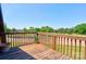 Picturesque deck offers views of the surrounding landscape and clear blue skies at 1307 Tiffany Ln, Shelby, NC 28152