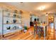 Dining area showcases open layout and modern shelving, seamlessly transitioning to other living spaces at 1307 Tiffany Ln, Shelby, NC 28152