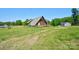 A-frame home on large, green acreage. The property is perfect for quiet, private living at 1307 Tiffany Ln, Shelby, NC 28152