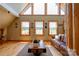 Bright and airy living room with vaulted ceilings, hardwood floors, and a spiral staircase at 1307 Tiffany Ln, Shelby, NC 28152