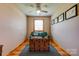 A bonus room featuring natural light, hardwood floors, and eclectic decor at 1307 Tiffany Ln, Shelby, NC 28152