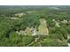 Aerial view shows the property is surrounded by trees at 1338 Pell Dr, Lincolnton, NC 28092