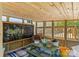 The back porch has a picnic table, a rug, and a chalkboard on the inside at 1338 Pell Dr, Lincolnton, NC 28092