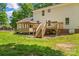 The fenced-in backyard includes a wooden deck with stairs and a ramp at 1338 Pell Dr, Lincolnton, NC 28092