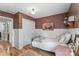 Small bedroom features neutral wall colors and hardwood floors at 1338 Pell Dr, Lincolnton, NC 28092