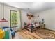 Cozy bedroom featuring a large window and hardwood floors at 1338 Pell Dr, Lincolnton, NC 28092