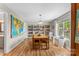 Sun-filled dining area features hardwood floors, built-in shelves, and abundant natural light at 1338 Pell Dr, Lincolnton, NC 28092