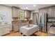 Well-equipped kitchen featuring modern appliances, stylish countertops, and ample cabinet space for storage at 1338 Pell Dr, Lincolnton, NC 28092