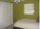 Bedroom featuring a bed, a window with blinds, closet and a ceiling fan with lights at 146 Barclay Ln, Mooresville, NC 28115