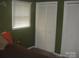 Bedroom featuring a comfortable bed, window, and closet, offering a relaxing and functional space at 146 Barclay Ln, Mooresville, NC 28115