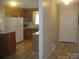 View of the kitchen featuring appliances, wood cabinets and a window at 146 Barclay Ln, Mooresville, NC 28115