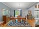 Charming dining room features hardwood floors, modern lighting, and ample natural light at 146 Paradise Peninsula Rd, Mooresville, NC 28117
