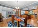 Open concept dining room connects living and kitchen with hardwood floors and modern lighting at 146 Paradise Peninsula Rd, Mooresville, NC 28117
