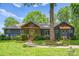 Charming blue home with stone accents, covered porch and landscaped front yard at 146 Paradise Peninsula Rd, Mooresville, NC 28117