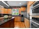 Bright kitchen with stainless steel appliances and a center island with a gas cooktop at 146 Paradise Peninsula Rd, Mooresville, NC 28117
