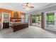 Spacious main bedroom with a walkout to deck, large windows, and recessed lighting at 146 Paradise Peninsula Rd, Mooresville, NC 28117