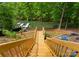 Wood staircase descends to the lake and boat dock at 146 Paradise Peninsula Rd, Mooresville, NC 28117