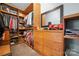 Walk-in closet with custom wood shelving and drawers providing organized storage space at 146 Paradise Peninsula Rd, Mooresville, NC 28117