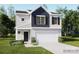 Charming two-story home featuring a two-car garage, a welcoming front porch, and a combination of siding and stone accents at 151 Astor St, Troutman, NC 28166