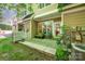 Cozy outdoor patio, perfect for relaxation, with seating and potted plants at 15318 Coventry Court Ln, Charlotte, NC 28277