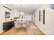 Bright dining area featuring an open-concept design flowing seamlessly to the kitchen at 15318 Coventry Court Ln, Charlotte, NC 28277