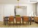 Contemporary dining room featuring a modern table and chairs with wood flooring at 155 Astor St, Troutman, NC 28166