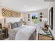 Bedroom with neutral walls, modern decor, and a view of the outdoors through the window at 1611 Spring Lot Dr, Edgemoor, SC 29712