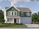 Charming two-story home with green and beige siding, manicured lawn, and a two-car garage at 1611 Spring Lot Dr, Edgemoor, SC 29712