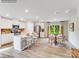 Well-lit kitchen with an island, stainless steel appliances, breakfast bar, and a connected dining area at 1611 Spring Lot Dr, Edgemoor, SC 29712