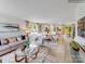 Open concept living room showcasing lots of natural light, hard surface flooring, and modern furnishings at 1611 Spring Lot Dr, Edgemoor, SC 29712